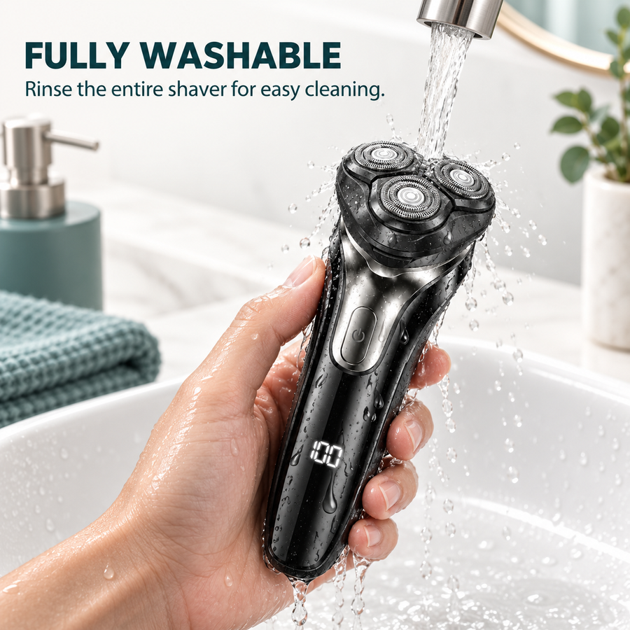 Fully washable rotary electric shaver being rinsed under running water.