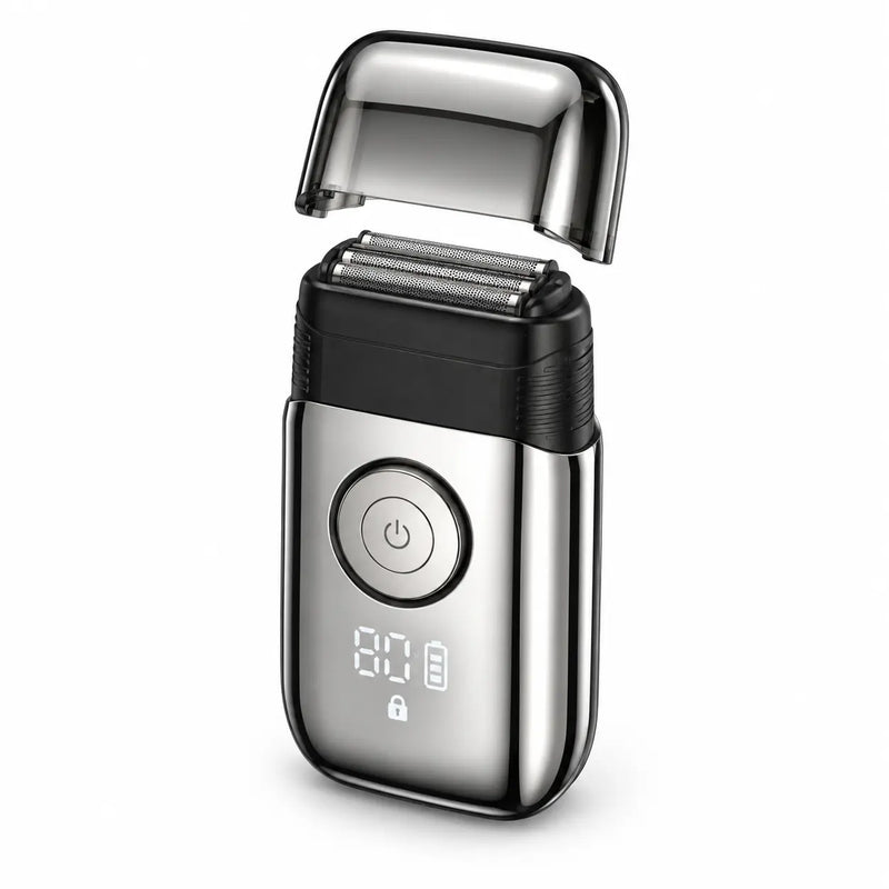 RYVO Model 9715 silver triple-foil reciprocating shaver on a white background